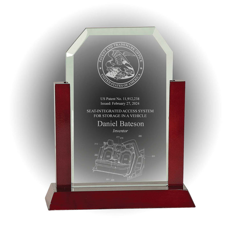 Beveled-top jade glass patent and inventor award mounted on rosewood base, engraved with USPTO seal and patent details