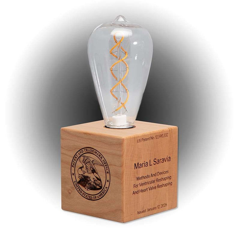Illumination Series cherry lighted inventor cube with laser engraved USPTO seal and illuminated bulb, front display