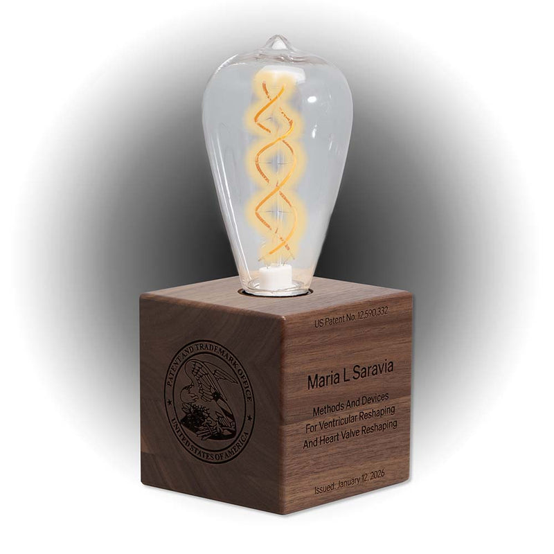 Illumination Series walnut lighted inventor cube with laser engraved USPTO seal and illuminated bulb, front display